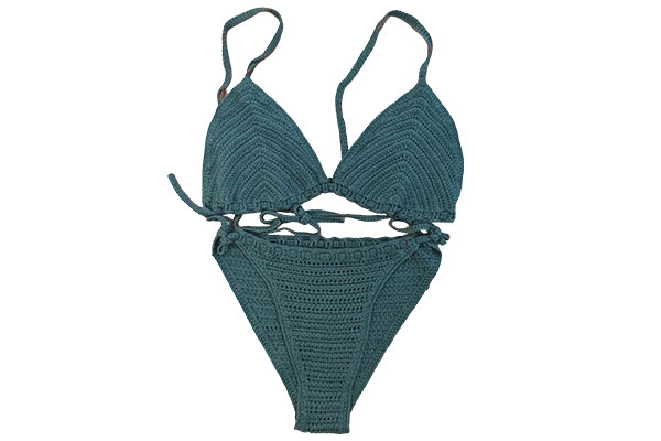 How does the unique stitch design of the Faux Crochet Swimsuit improve its comfort in the water?